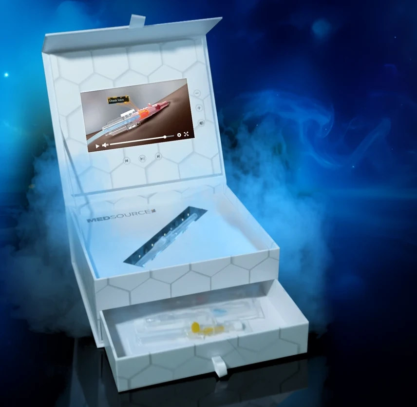 Ectobook interactive sample box with embedded video display, branded for Medsource Labs
